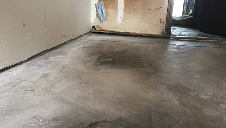 Basement floor leveling before repair