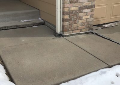 sinking concrete walkway colorado