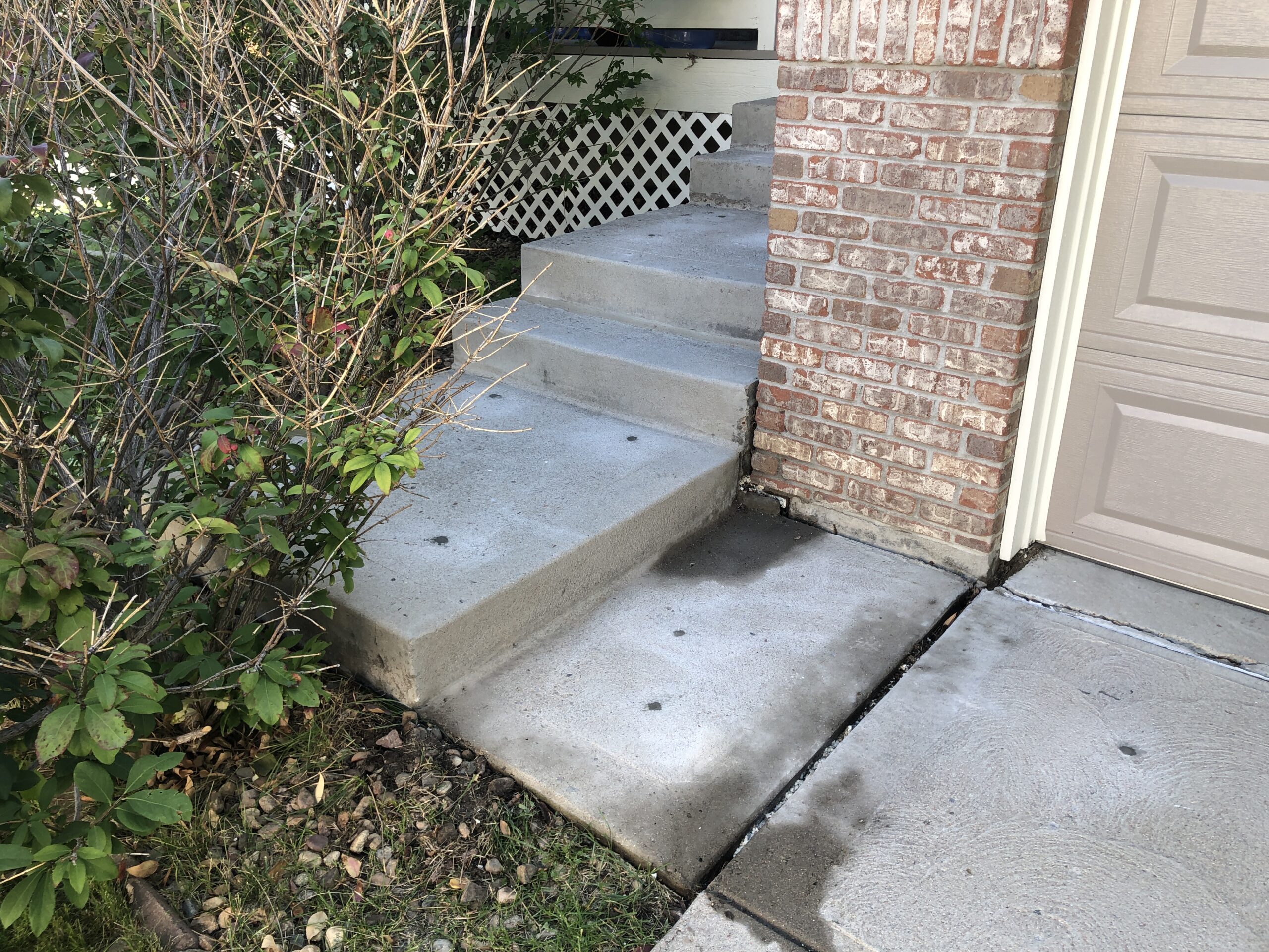 Settled Concrete Patio and Front Steps